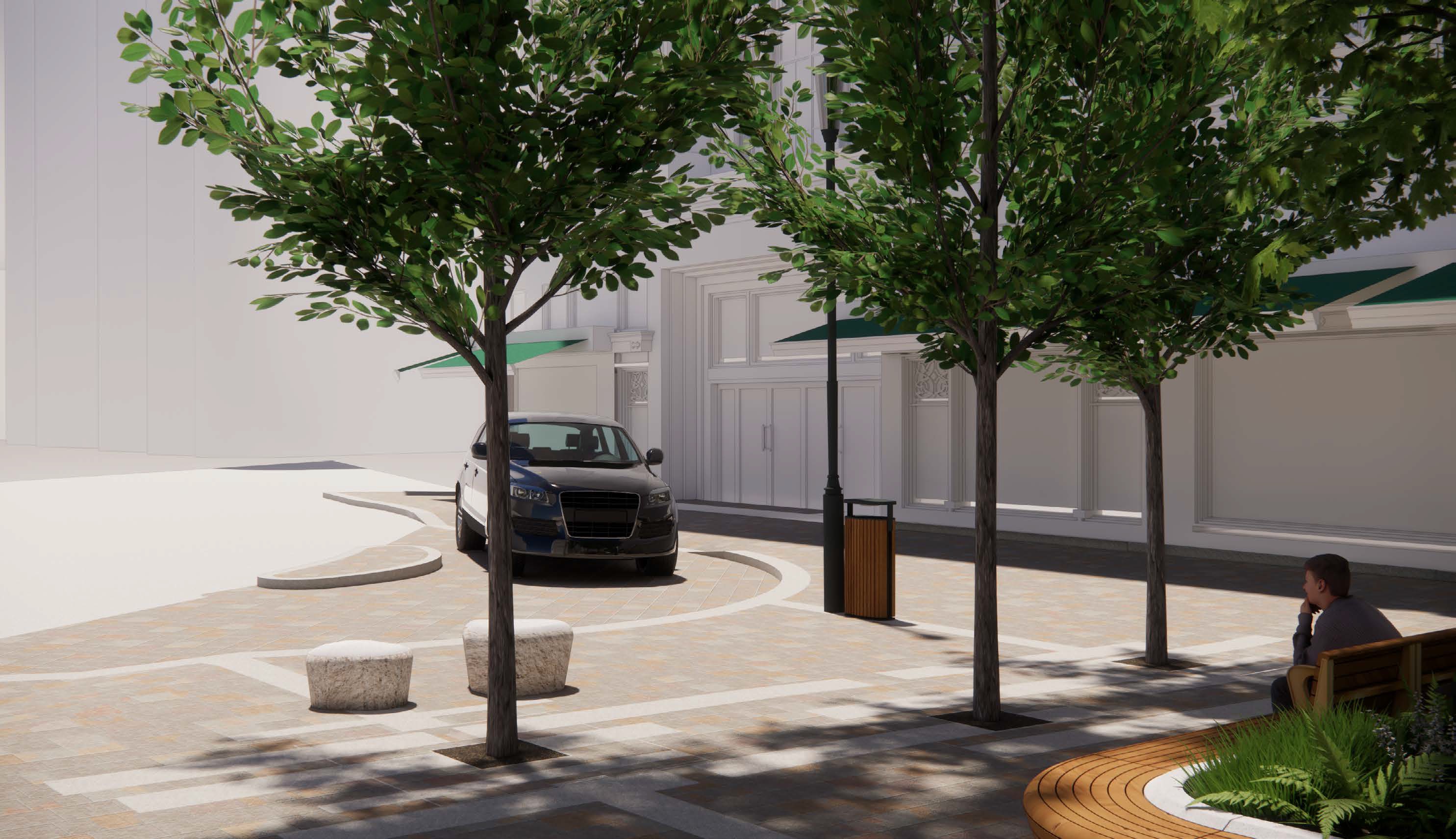 This is an image looking towards Basil Street from the paved space on Hans Crescent adjacent to Harrods. A semi-circular lay-by can be seen with kerbs separating the vehicular set down area from the paved pedestrian area.  One car is shown within the set down area although it could accommodate two. Three trees are shown in the foreground as well as a bin and a pair of stone plinths (to provide informal seating). Timber benching set upon a stone planter can be glimpsed in the corner of the image.